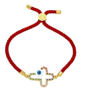 Red braided evil eye bracelet with colorful zircons and golden cross charm