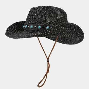 Detail of black woven cowboy hat featuring turquoise beads and silver metal studs trim