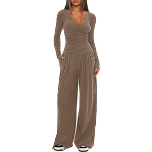 Detail of deep brown V-neck wrap top and high-waisted wide-leg pants set for women
