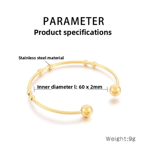Detailed view of gold stainless steel C-shaped cuff bracelet with measurements