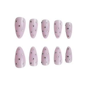 Light purple almond press-on nails with sparkling rhinestones in a set of 10 pieces