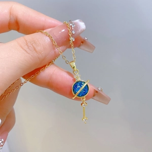 Elegant gold titanium steel necklace with a blue star-shaped planet pendant and crystals