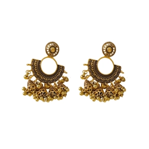 Vintage golden Jhumka earrings with intricate crescent design and small bell charms