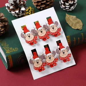 Detail of 6-pack Christmas wooden reindeer clips for festive decor and gift wrapping