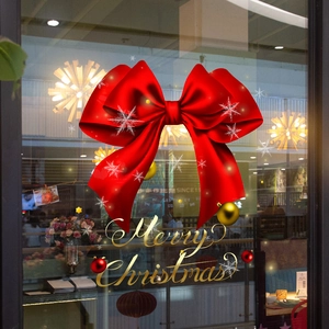 Red bow Merry Christmas window decals with snowflakes for festive shop window decoration