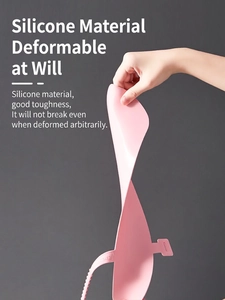 Flexible pink silicone toilet seat cover cushion showing superior elasticity and durability