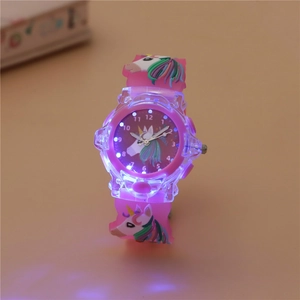 Pink silicone kids watch with luminous LED lights and cute unicorn patterns on the dial