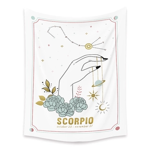 Detail of Scorpio zodiac tapestry with gold floral illustrations and astrology symbols