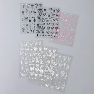 Detail view of 6-pack 3D laser silver butterfly nail art stickers with various heart motifs