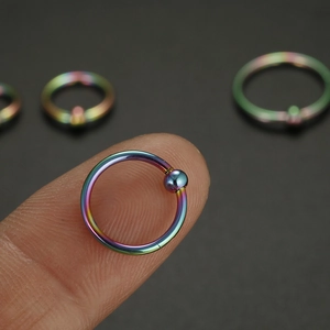 Rainbow stainless steel hoop ring with bead for nose and ear piercing on finger