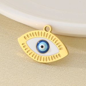 Macro view of 18K gold stainless steel evil eye pendant with blue enamel detailing