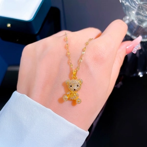 Exquisite gold-plated teddy bear necklace with sparkling zircons on a delicate chain