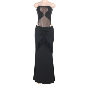 Detail of black halter maxi dress featuring mesh cut-outs and ruffled peplum waist detail