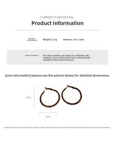 Detailed view of leopard print hoop earrings with iron core and silver needles
