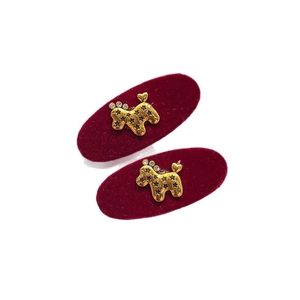 Pair of red velvet hair clips with golden poodle motif and star pattern for women