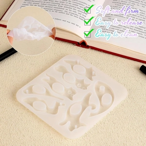 Flexible silicone book page holder mold featuring cute cat and rabbit animal shapes