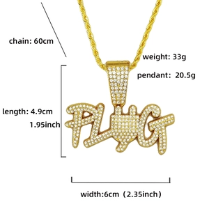 Detailed view of gold PLUG pendant necklace with white stones and rope chain details