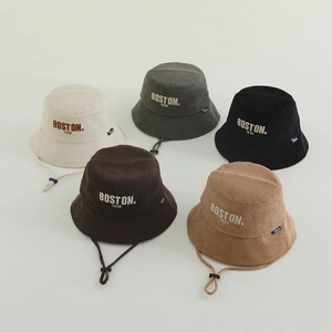 Toddler corduroy bucket hats in five colors with BOSTON embroidery and adjustable straps