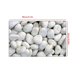 Detail showing 80x50cm dimensions of the pebble patterned absorbent bath mat