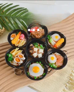 Set of seven realistic Japanese udon noodle bowl keychains with assorted toppings