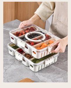 Stackable transparent plastic fridge storage boxes with white handles for organization