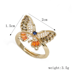 Detail of copper butterfly ring with colorful zircons and size measurements shown