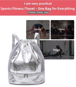 Detail showing the bottom zippered dry wet separation compartment of the silver fitness bag