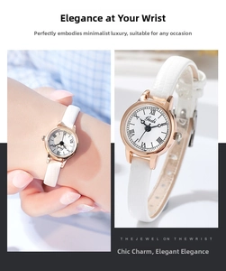 Macro detail of Gedi women's watch with Roman numeral dial and white leather strap