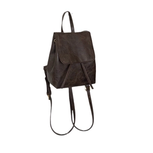 Minimalist vintage brown faux leather backpack with drawstring closure on white background