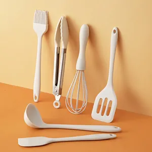 6-piece cream silicone baking tool set with whisk, spatula, and brush for home kitchens
