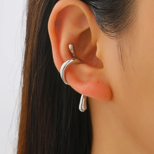 Minimalist silver snake-shaped ear cuff in punk style for non-pierced ears