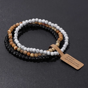 Three-piece set of 4mm natural gemstone beaded stretch bracelets with nature theme tags