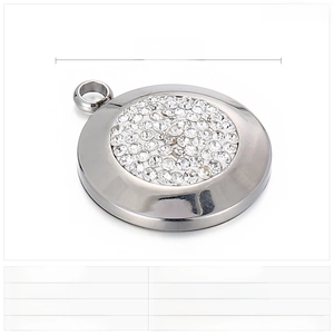 Macro view of 19mm circular stainless steel pendant with pavé set rhinestones details