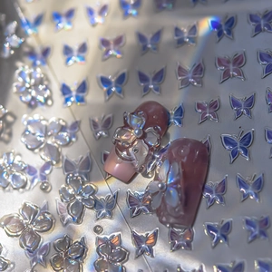 3D jelly nail stickers with iridescent Aurora flowers and tiny pearls on pink base