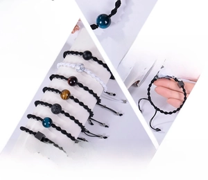 Detailed macro view of adjustable 12mm white turquoise and black magnetic stone bracelets