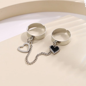 Silver double finger ring with fine chain connection and black pixel heart pendant