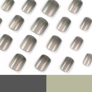 Short cat-eye press-on nails in grey-green with aurora shimmer, square-round shape