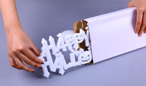 Close-up of Happy Halloween LED window suction light with white packaging box display
