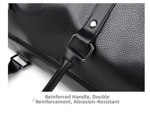 Close-up of reinforced handle and metal buckle on black lychee texture travel bag