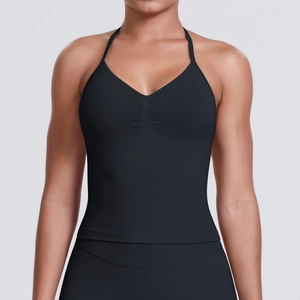 Close-up of seamless black sports camisole with V-neckline and ruched chest detail