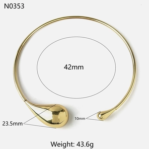 Polished gold metal open choker with asymmetrical water drop charms for women