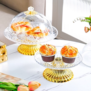 Macro detail of diamond texture on transparent cake stand with elegant gold base