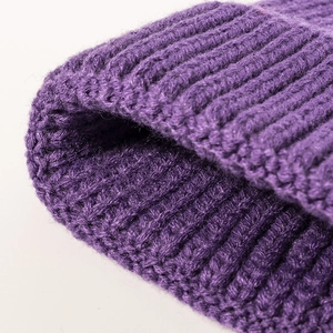 Thick purple ribbed knit beanie cap for winter featuring premium warm wool texture