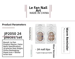 Set di 24 unghie finte sfumate rosa con stelle argentate e colla da 1g in dettaglio