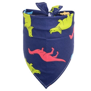 Detailed close-up of dark blue pet bandana with neon dinosaur print and neat edge stitching