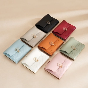 Short PU leather wallets for women with floral metal buckles in eight stylish colors