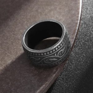 Retro wide titanium steel ring with antique silver totem engraving and vintage finish