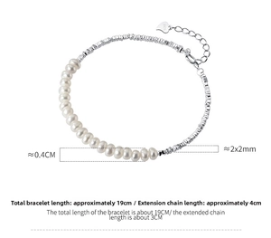 Detail of S925 silver irregular beads and 4mm pearls with lobster clasp and heart tag