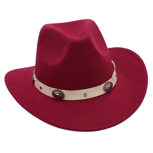 Detailed close-up of wine red felt cowboy hat with vintage metal studded belt trim