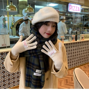 Winter set with white knit beret, checkered scarf, and warm thick gloves for women